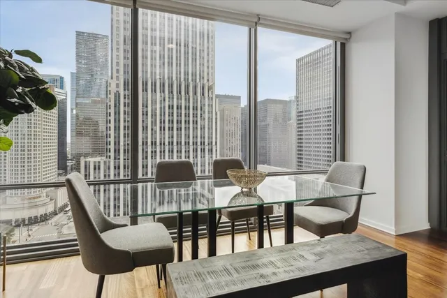 a view of a balcony with furniture