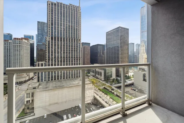 a view of balcony with wooden floor