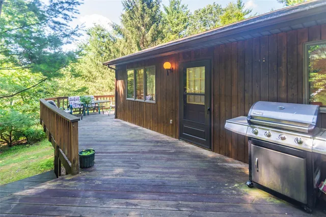 a backyard of a house with seating space