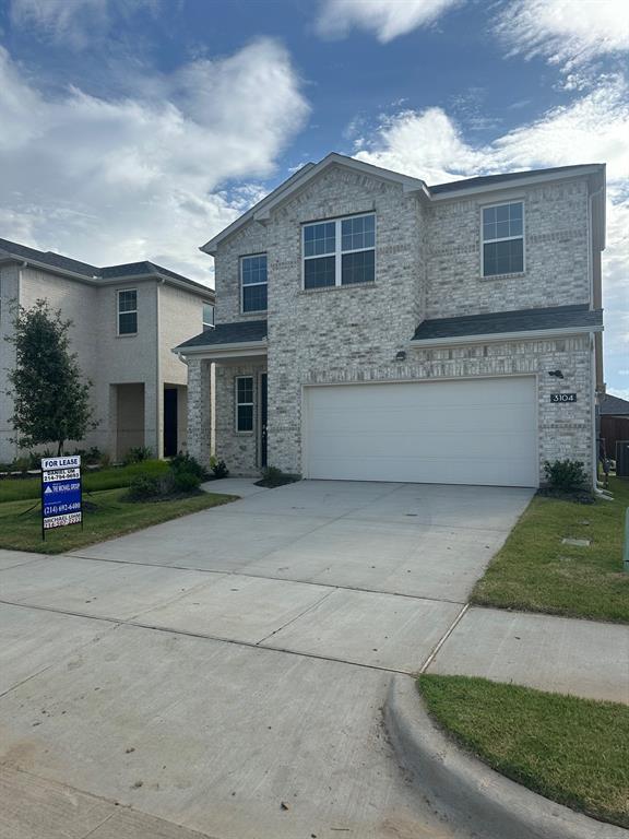 3104 Camilli Cove Princeton, TX 75407 - Photo 2 of 15 a front view of a house with a yard and garage