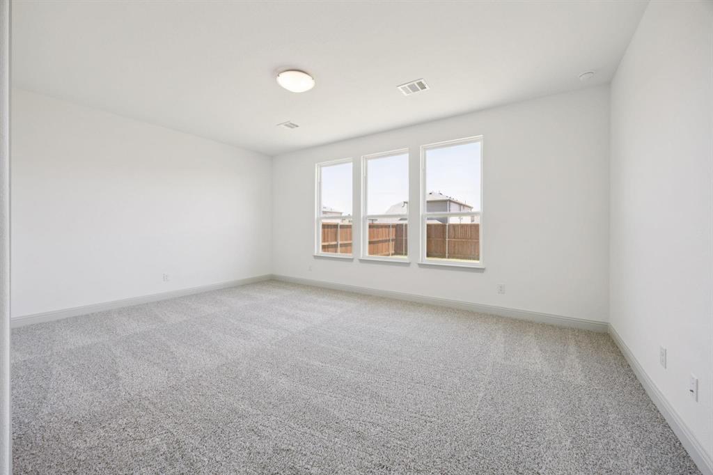 3104 Camilli Cove Princeton, TX 75407 - Photo 8 of 15 an empty room with a window
