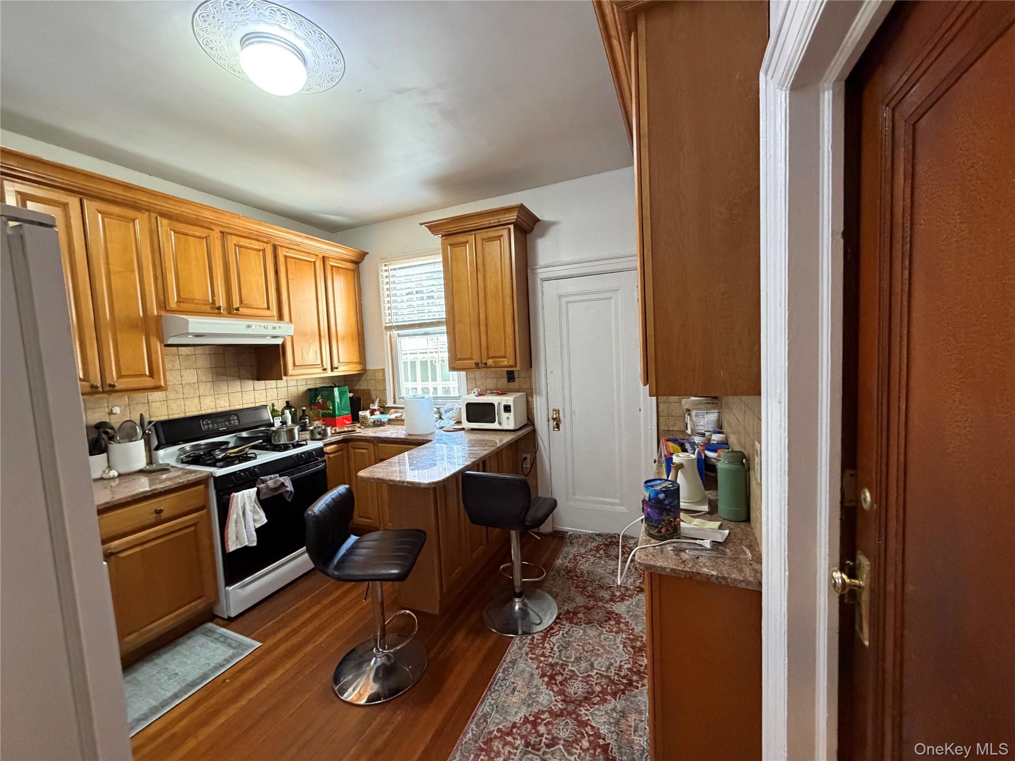 40-36 69th Street Queens, NY 11377 - Photo 14 of 32 1st floor kitchen