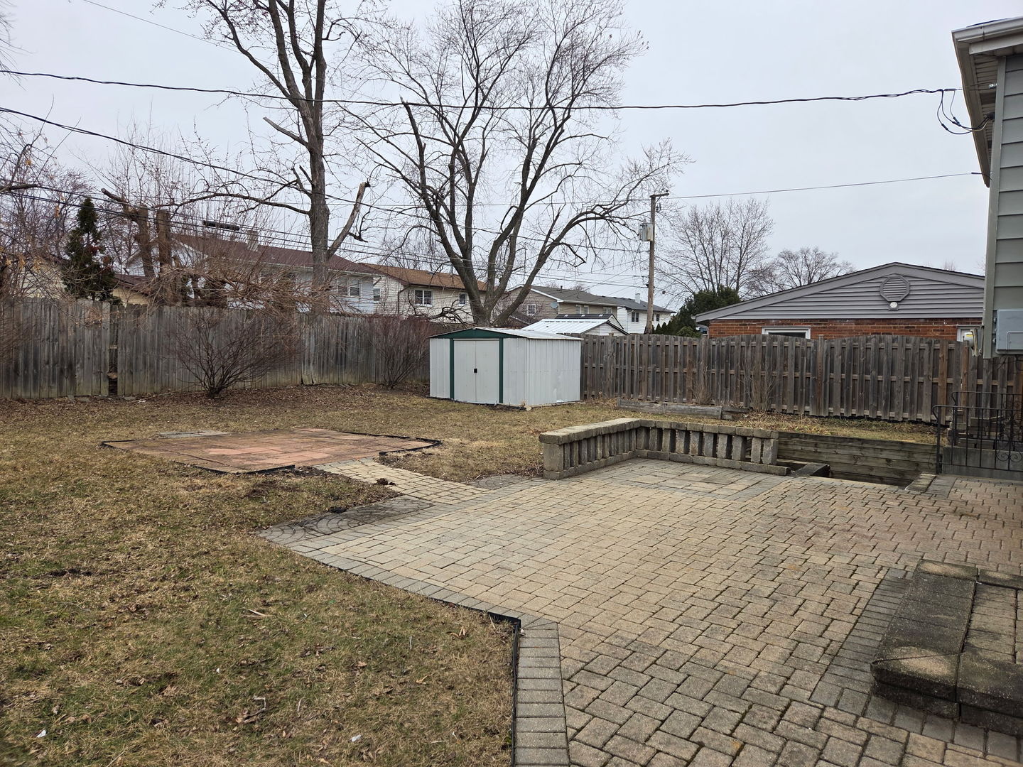 756 West Millers Road Des Plaines, IL 60016 - Photo 26 of 27 a view of wooden fence next to a yard