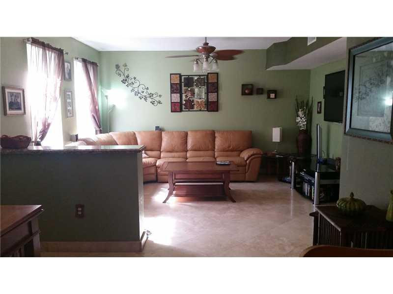6942 West Sample Road, Unit 6942 Pompano Beach, FL 33063 - Photo 13 of 30 Living Room