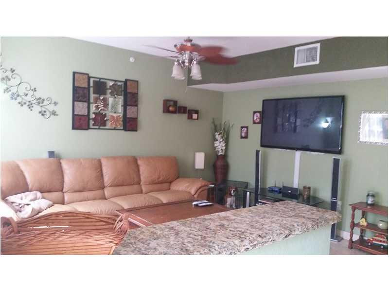 6942 West Sample Road, Unit 6942 Pompano Beach, FL 33063 - Photo 14 of 30 Living Room