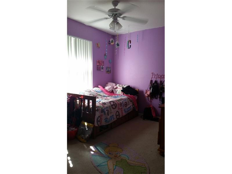 6942 West Sample Road, Unit 6942 Pompano Beach, FL 33063 - Photo 19 of 30 Master Bedroom