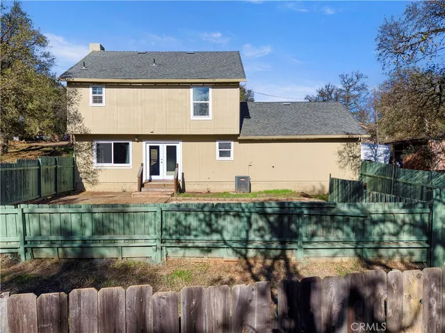 a view of a house with a lake view