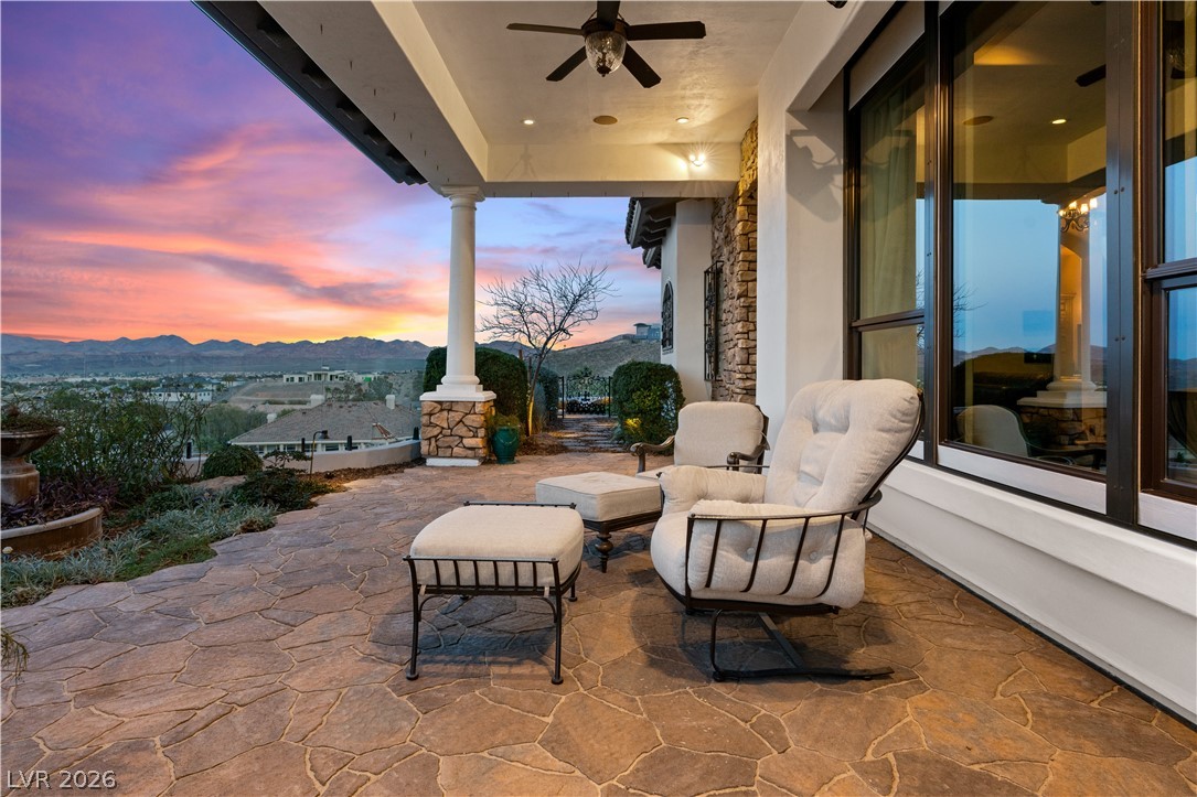 1123 Christian Road Henderson, NV 89002 - Photo 74 of 94 Relax on the stone patio and watch the sunset over distant mountains from this outdoor sanctuary.