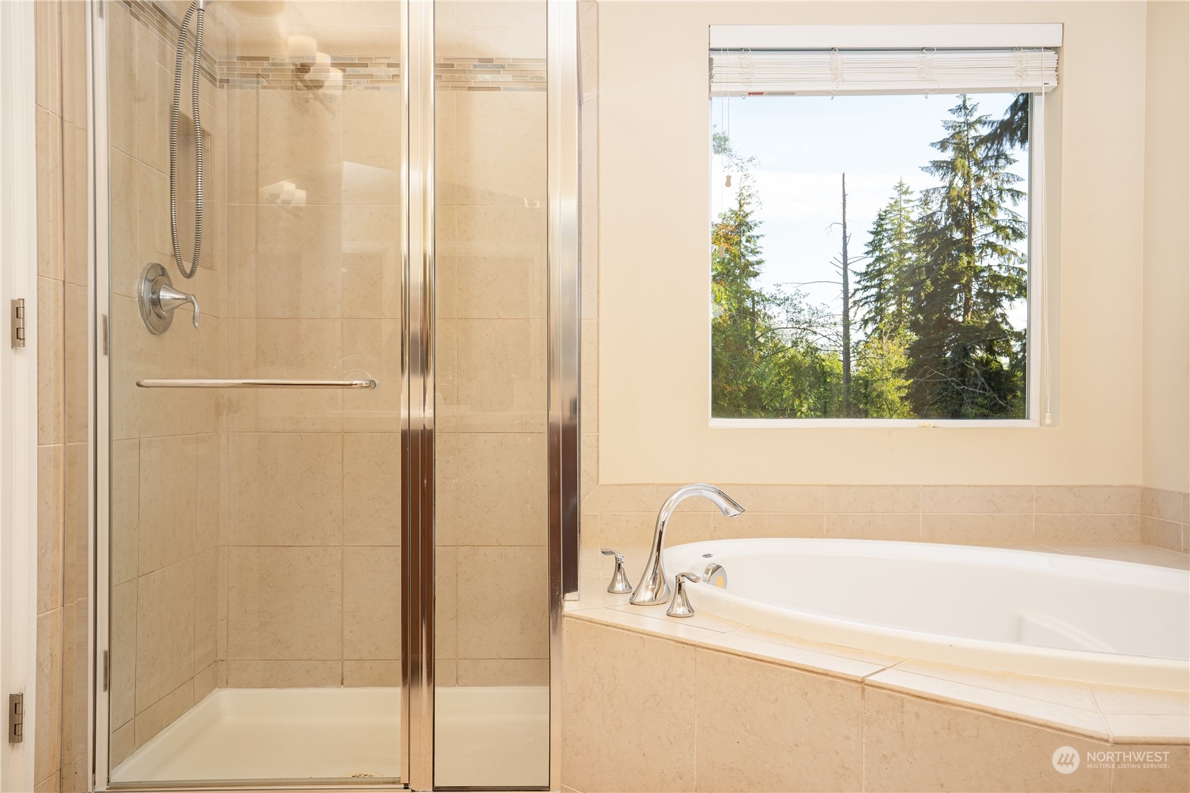 3326 177th Place Southeast Bothell, WA 98012 - Photo 15 of 26 a bathroom with a bathtub and a shower