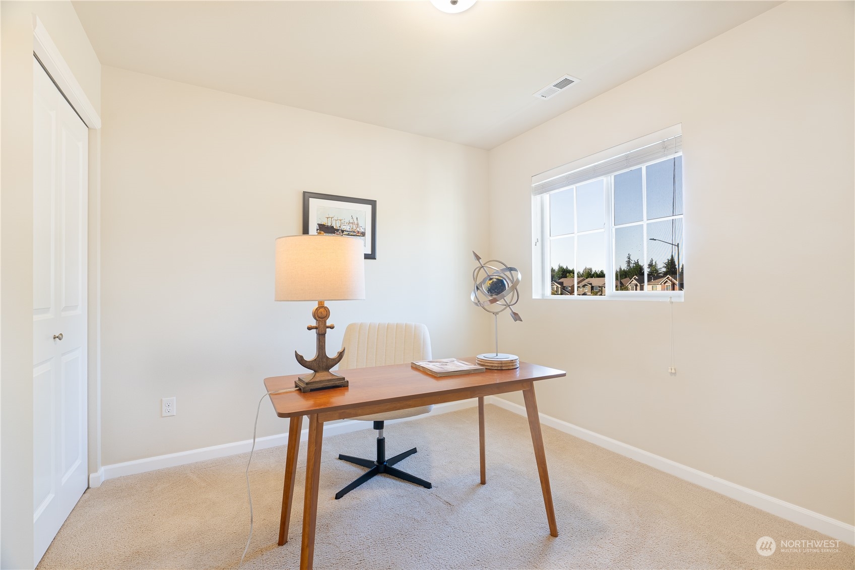 3326 177th Place Southeast Bothell, WA 98012 - Photo 18 of 26 a view of a workspace with furniture