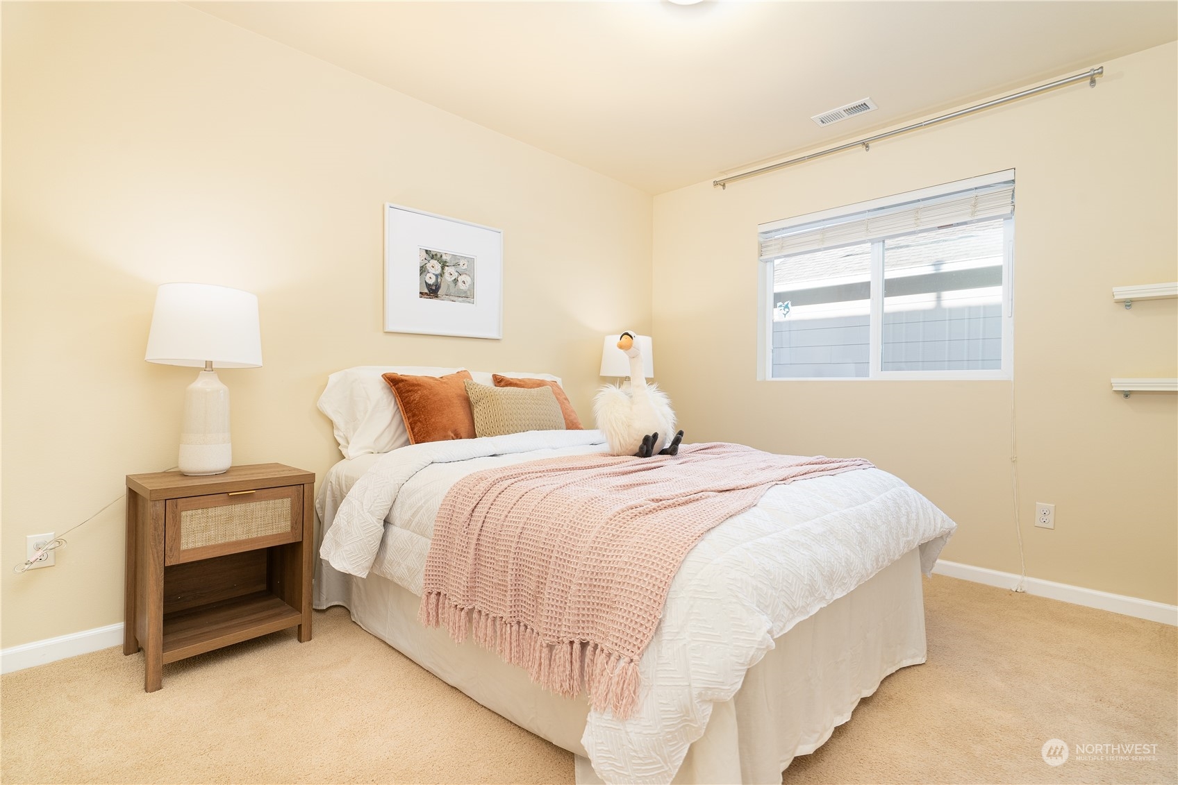 3326 177th Place Southeast Bothell, WA 98012 - Photo 19 of 26 a bedroom with a bed and a window