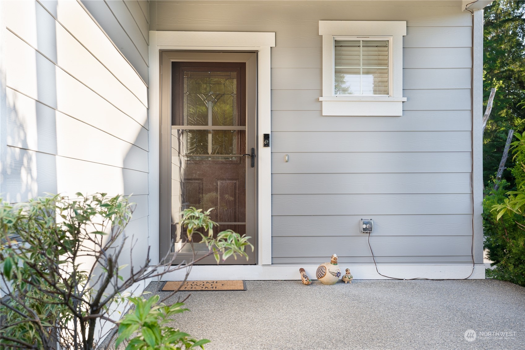 3326 177th Place Southeast Bothell, WA 98012 - Photo 2 of 26 a backyard of a house with outdoor seating