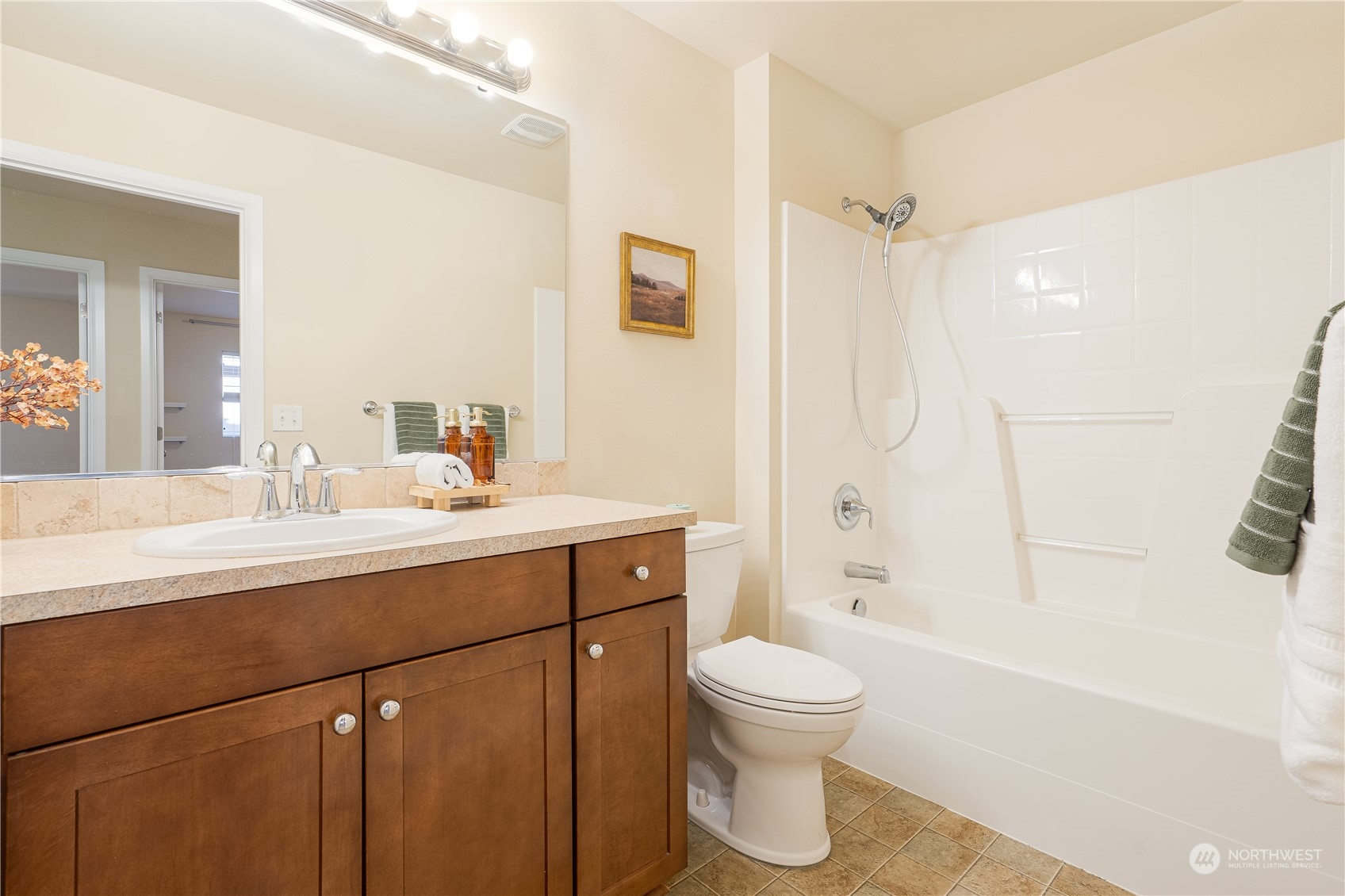 3326 177th Place Southeast Bothell, WA 98012 - Photo 21 of 26 a bathroom with a sink a toilet and shower