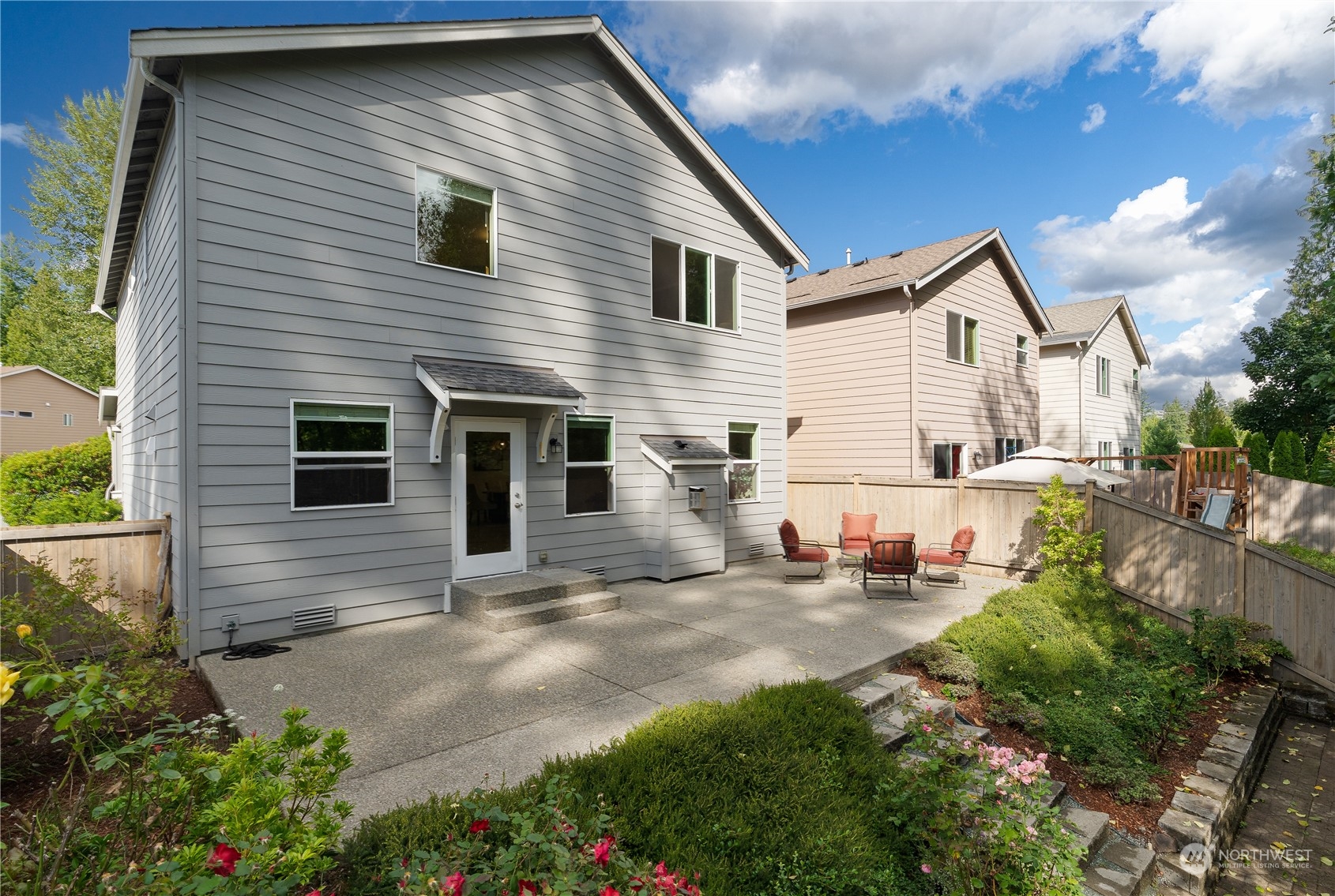 3326 177th Place Southeast Bothell, WA 98012 - Photo 25 of 26 a view of backyard of house and outdoor seating
