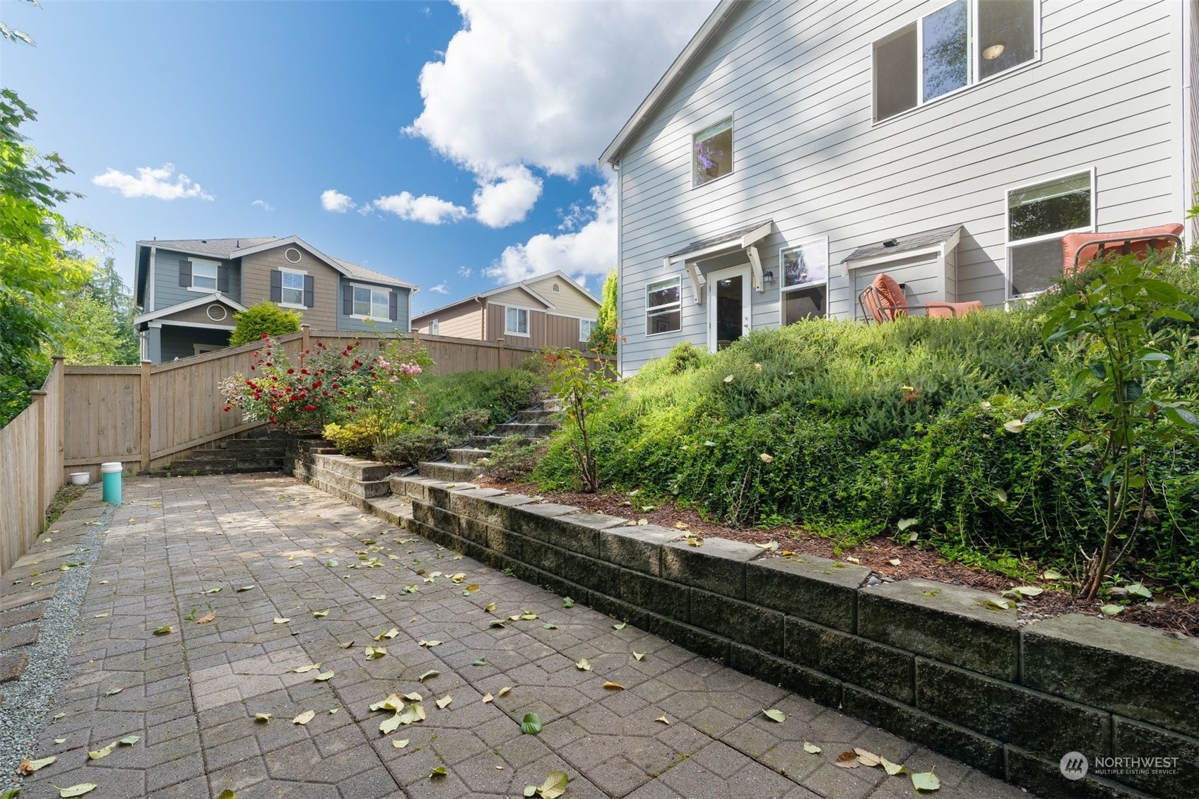 3326 177th Place Southeast Bothell, WA 98012 - Photo 26 of 26 a front view of a house with a yard and potted plants