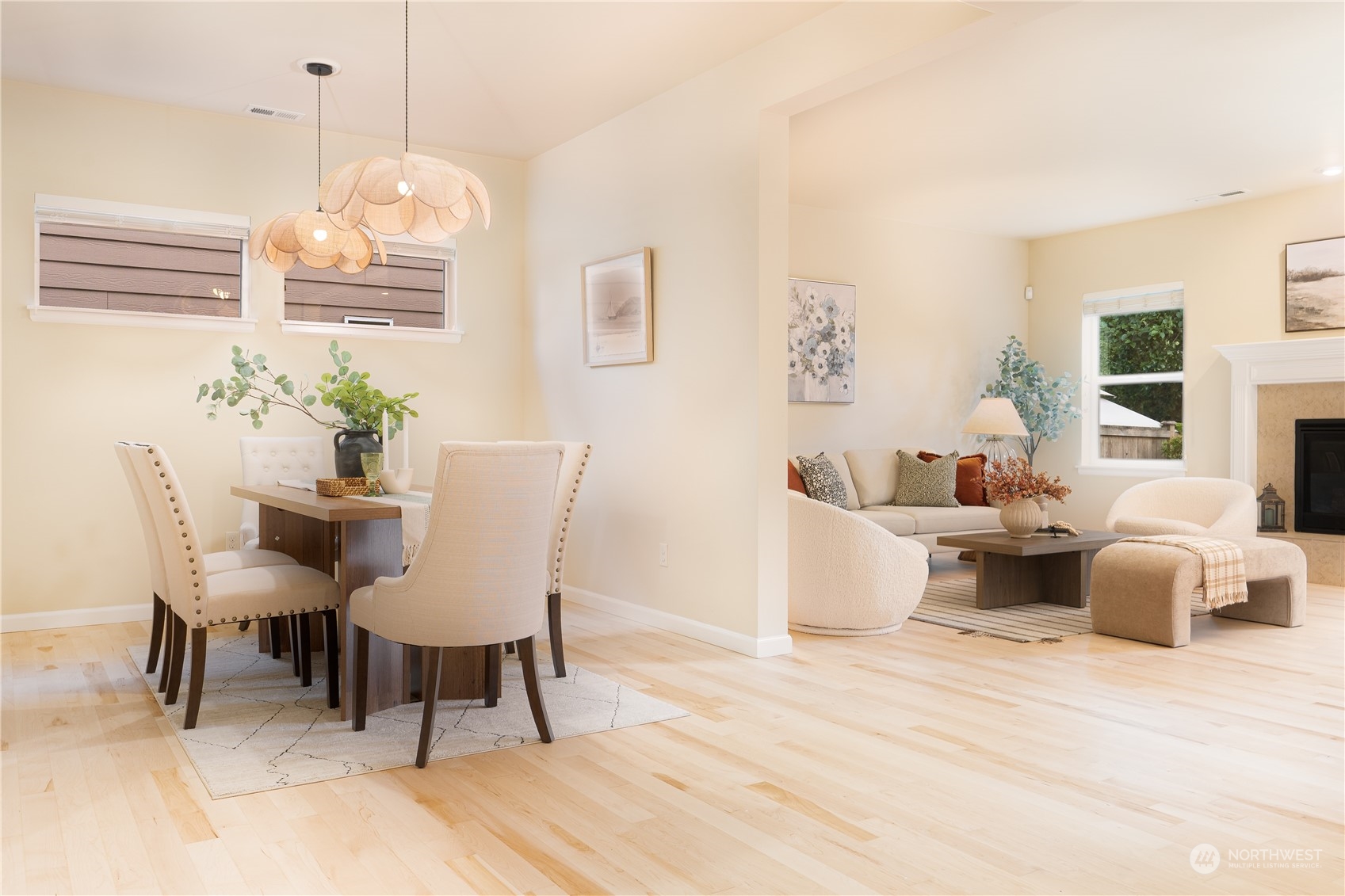 3326 177th Place Southeast Bothell, WA 98012 - Photo 7 of 26 a dining room with furniture a chandelier and wooden floor