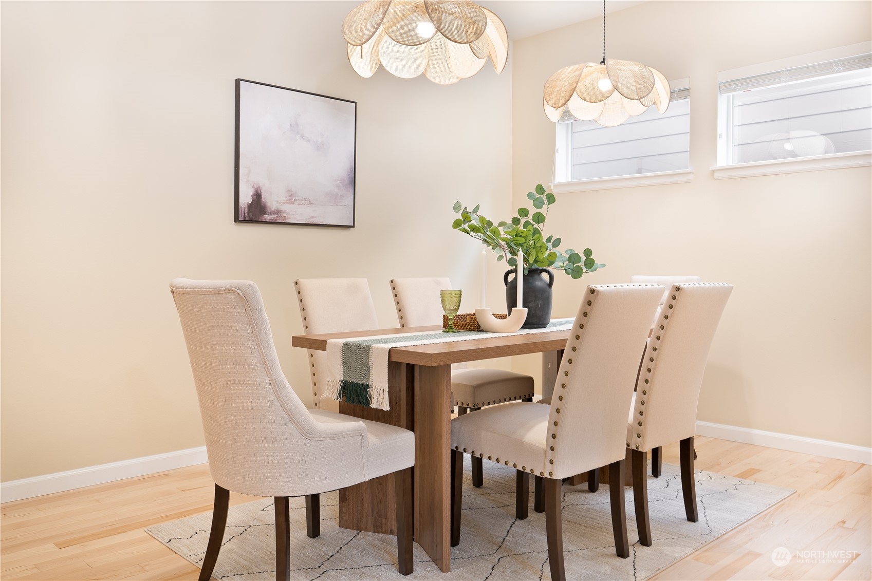 3326 177th Place Southeast Bothell, WA 98012 - Photo 8 of 26 a view of a dining room with furniture and wooden floor