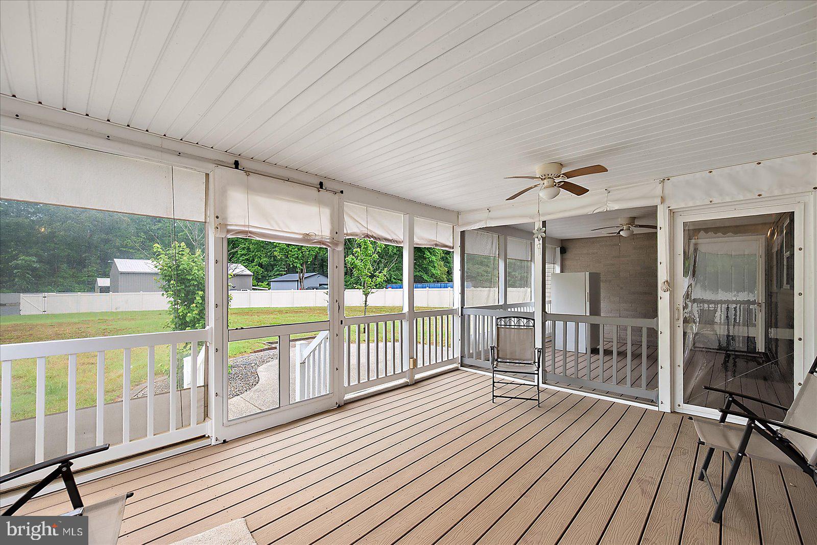 8225 Whitesville Road Pittsville, MD 21850 - Photo 25 of 45 a view of a balcony with wooden floor