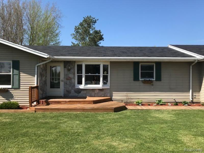 6541 Severance Road Cass City, MI 48726 - Photo 3 of 25 Here's a view of the professional landscaping.