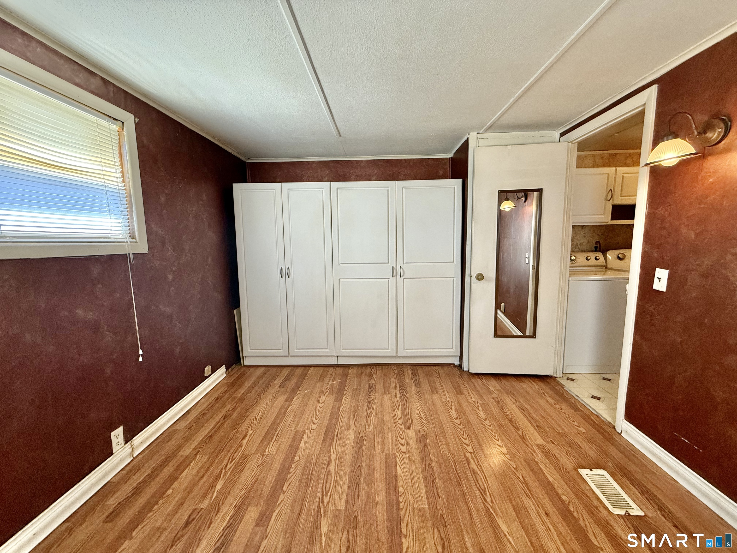 9 N Road East Windsor, CT 06088 - Photo 19 of 20 a view of a room with wooden floor and a window
