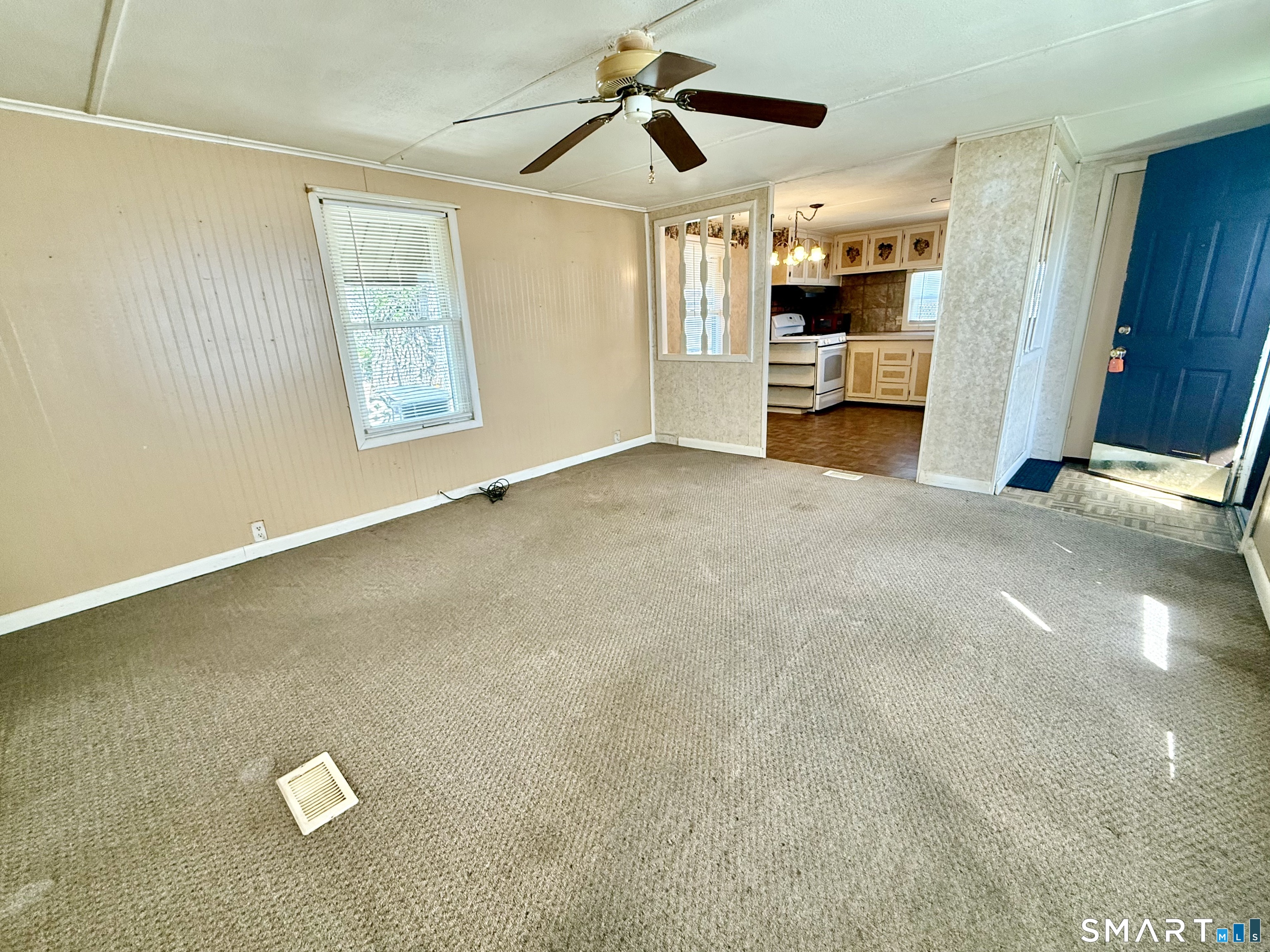 9 N Road East Windsor, CT 06088 - Photo 5 of 20 a view of a livingroom with furniture and a flat screen tv