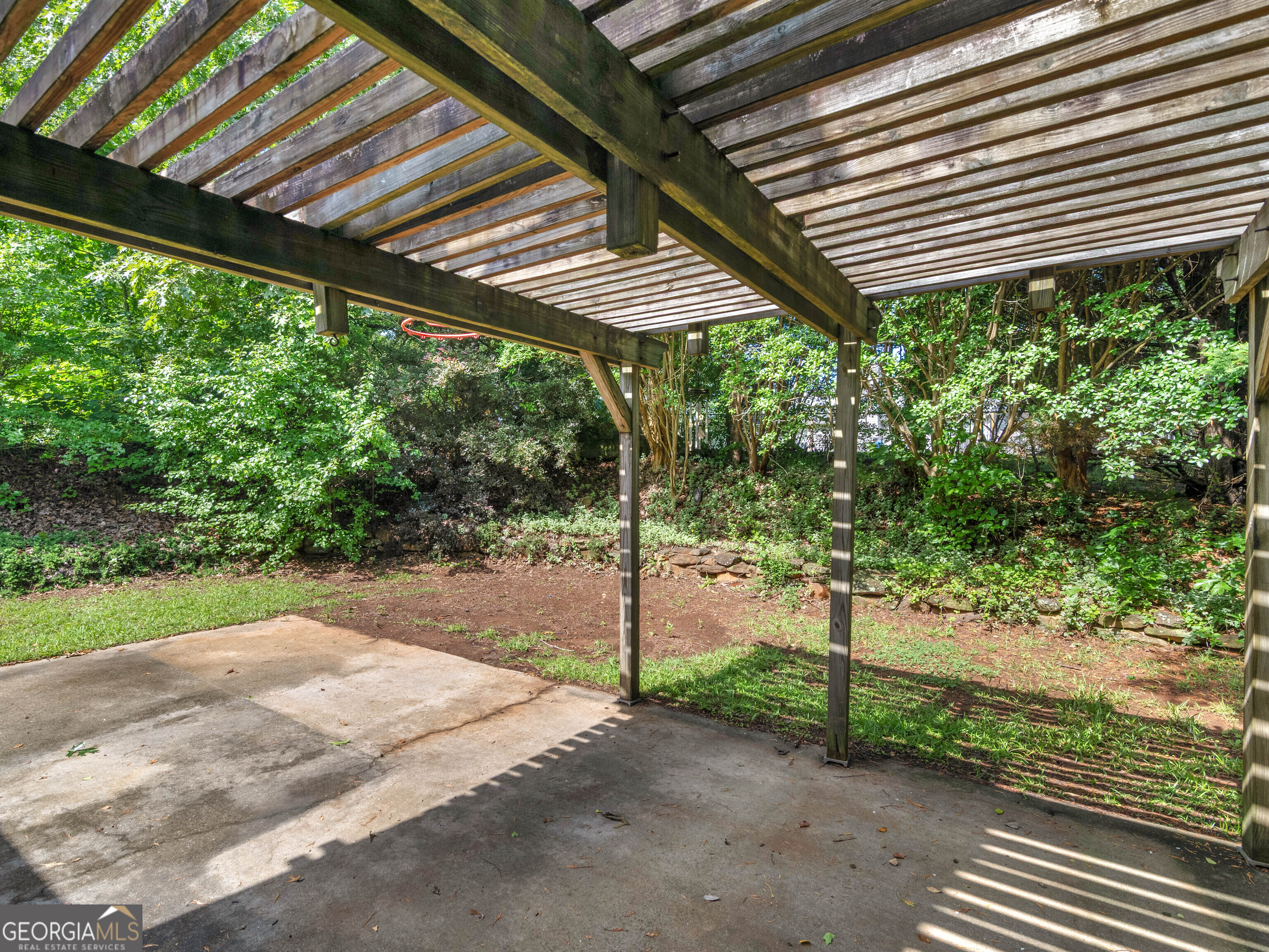 404 Northwind Place Stockbridge, GA 30281 - Photo 11 of 56 a backyard of a house with a garden
