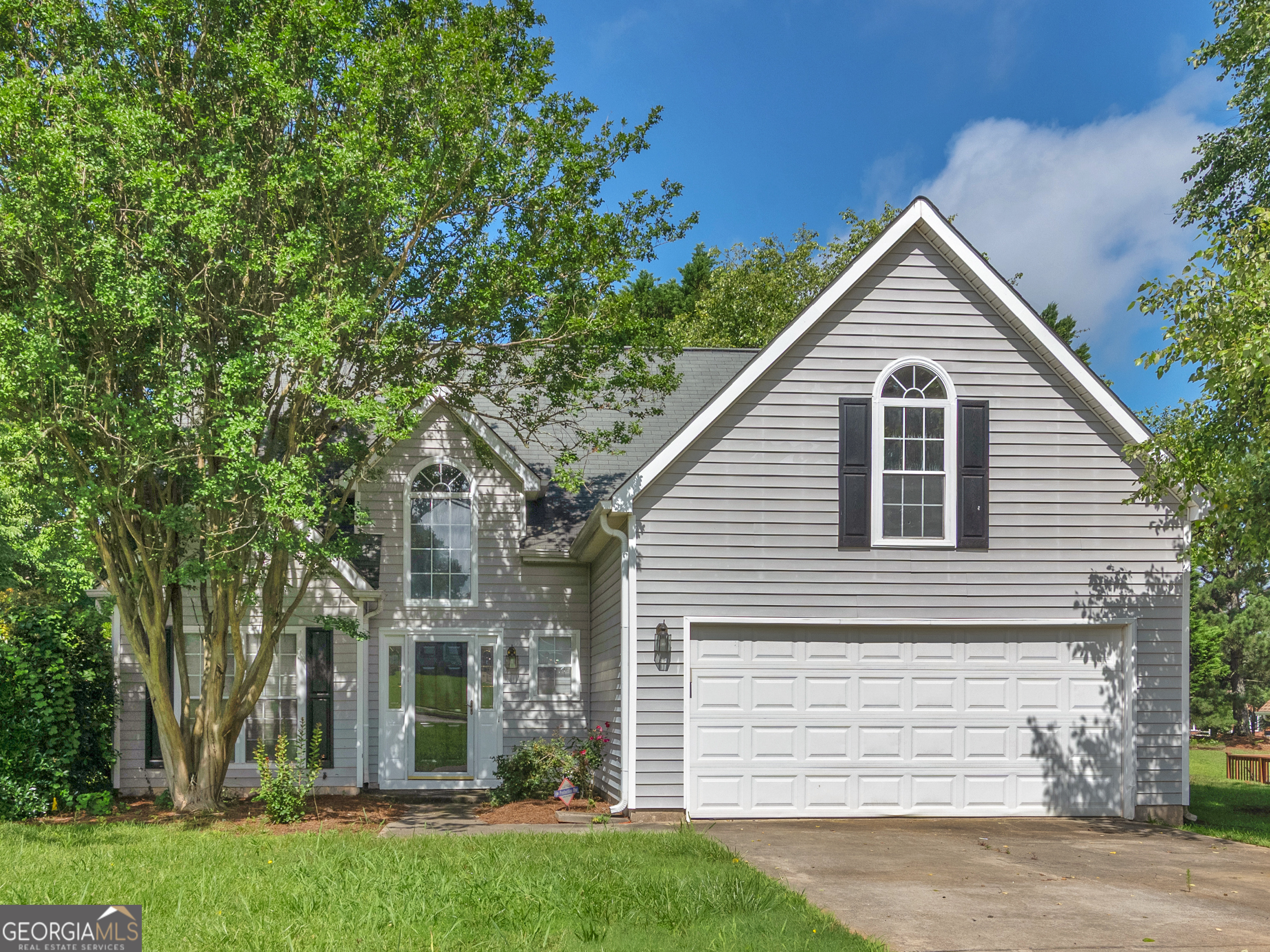 404 Northwind Place Stockbridge, GA 30281 - Photo 3 of 56 a view of a house with a yard