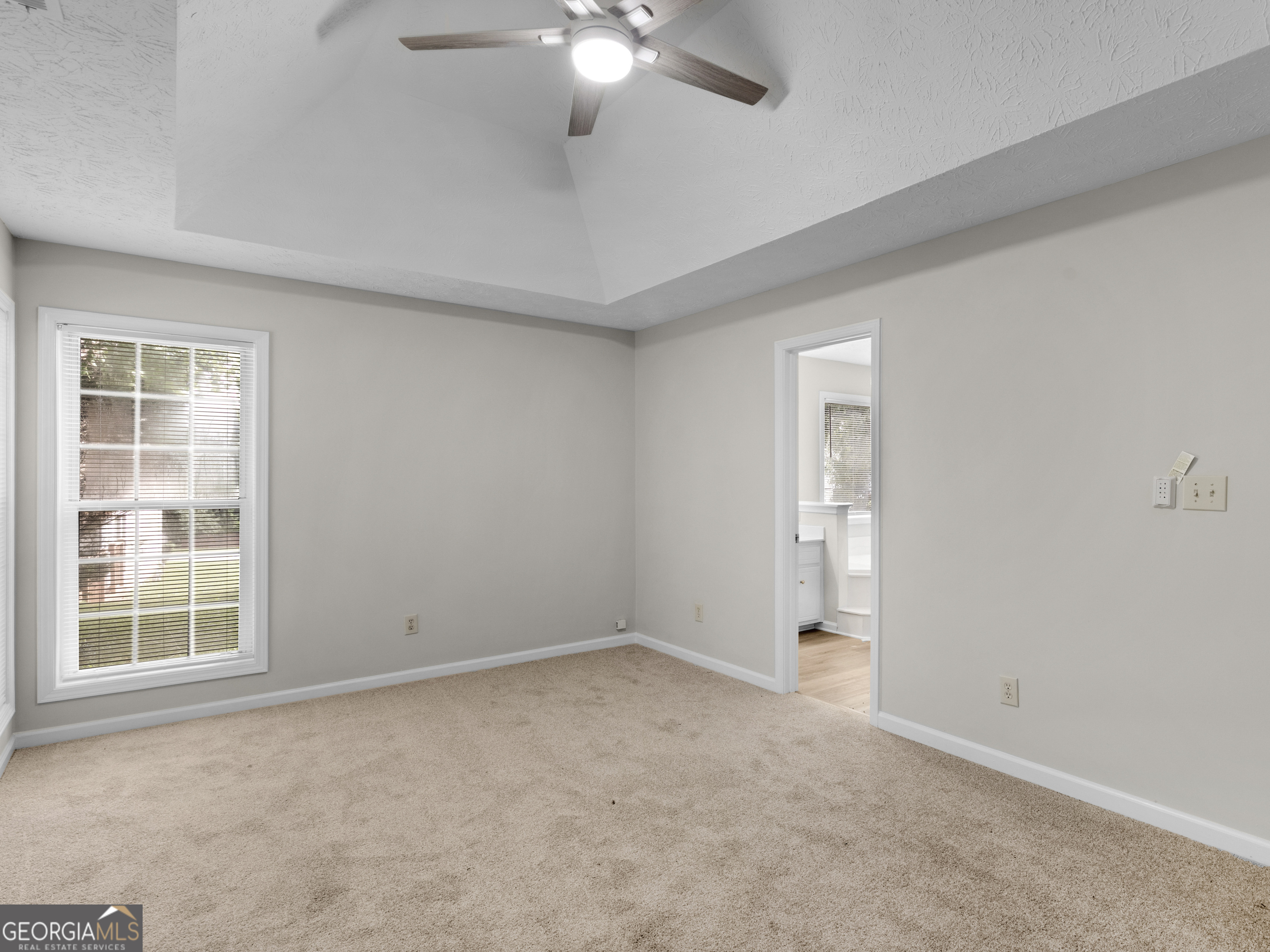 404 Northwind Place Stockbridge, GA 30281 - Photo 33 of 56 a view of an empty room with a window