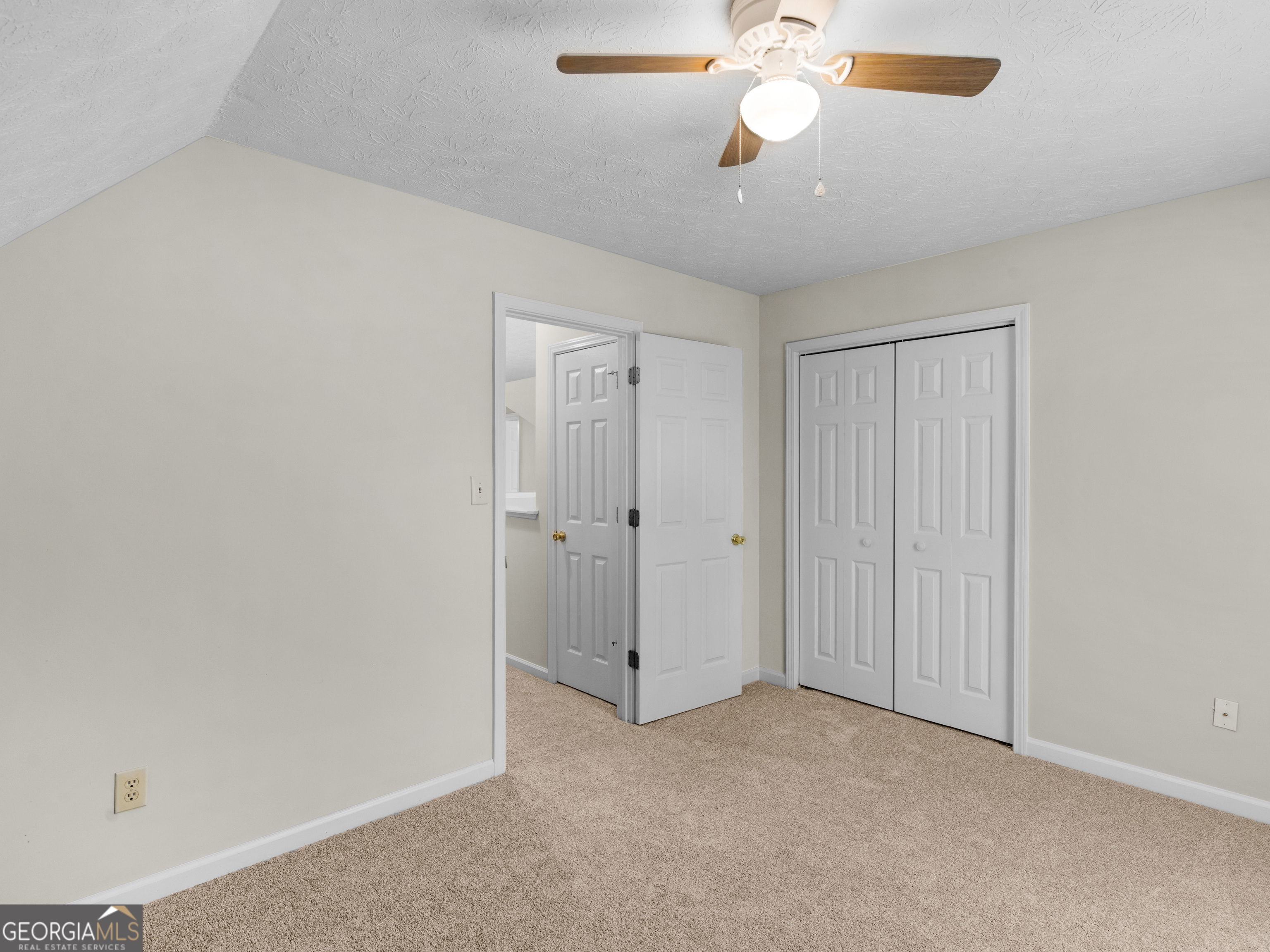 404 Northwind Place Stockbridge, GA 30281 - Photo 46 of 56 a view of an empty room and chandelier fan