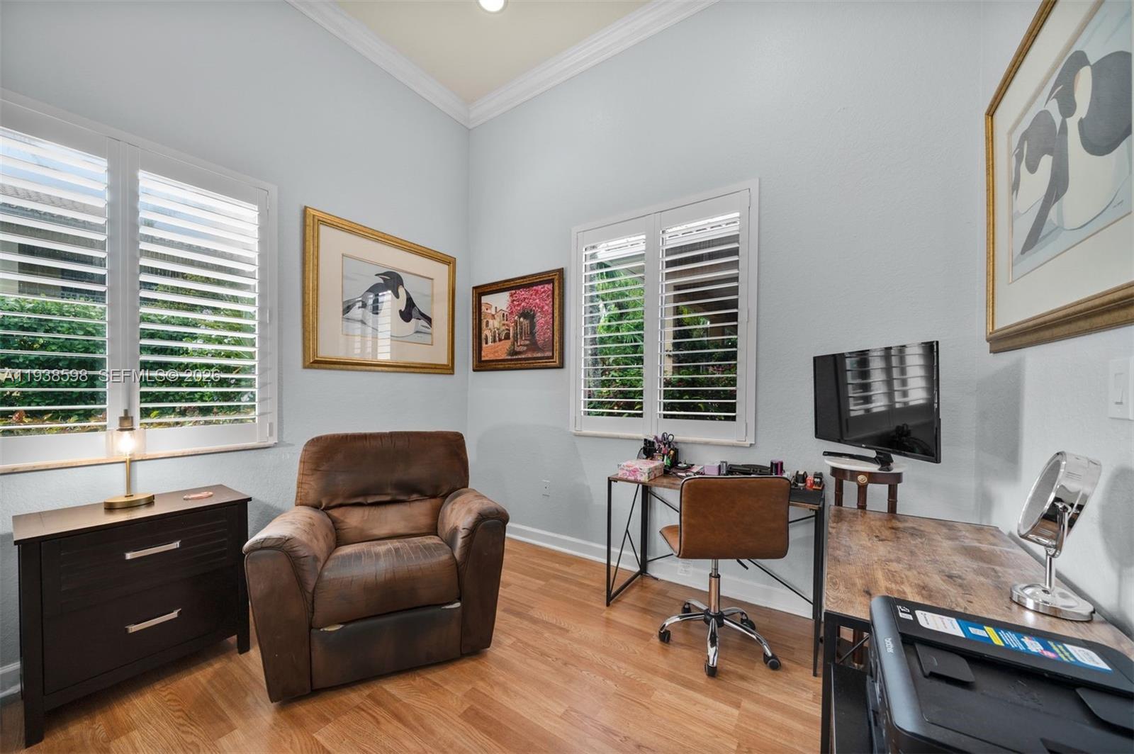 7548 Southwest 190th Street Cutler Bay, FL 33157 - Photo 20 of 53 a livingroom with workspace couch and a window