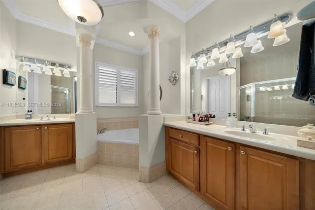 a bathroom with a double vanity sink mirror and double