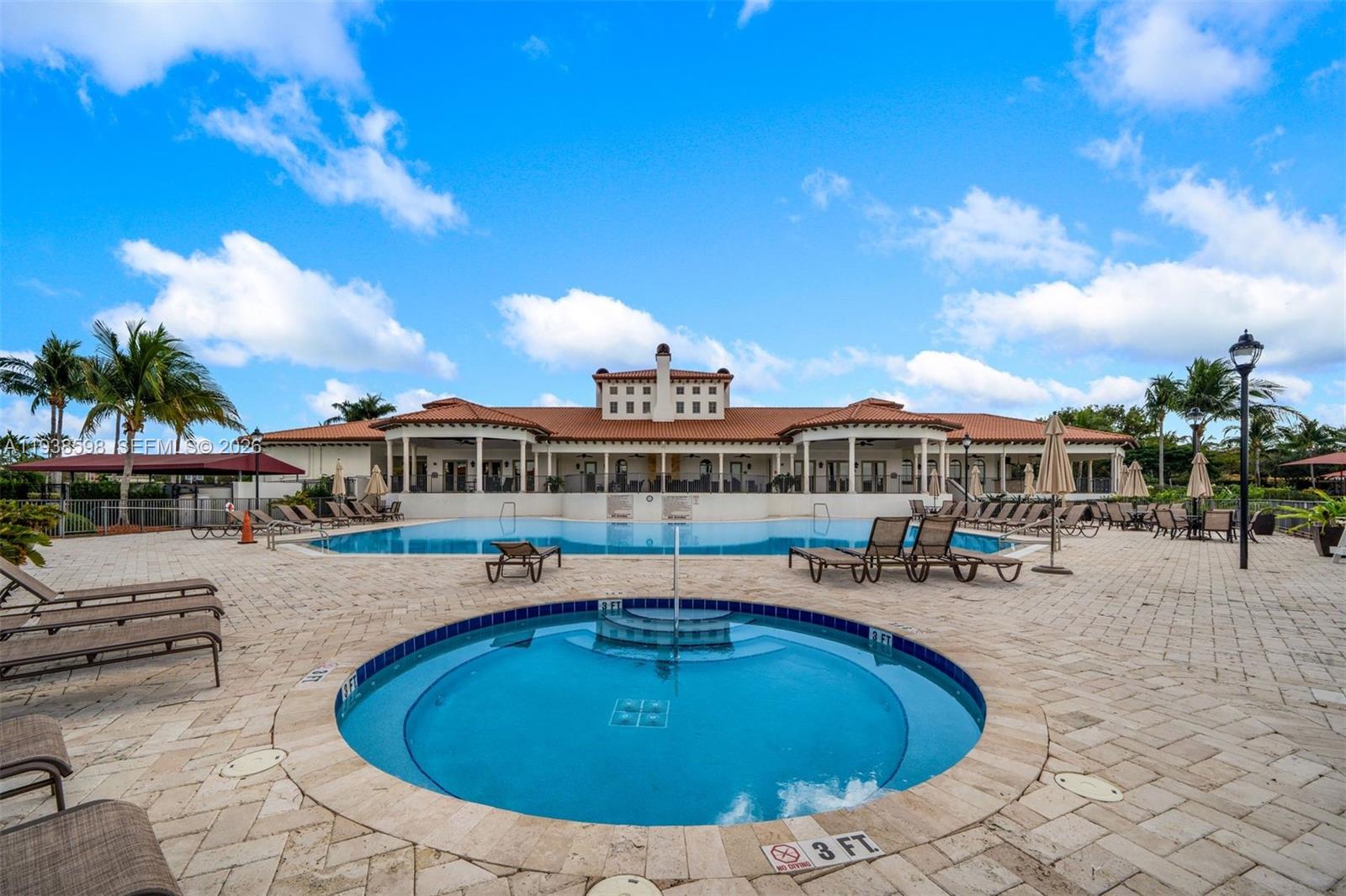 7548 Southwest 190th Street Cutler Bay, FL 33157 - Photo 45 of 53 a view of swimming pool with outdoor seating