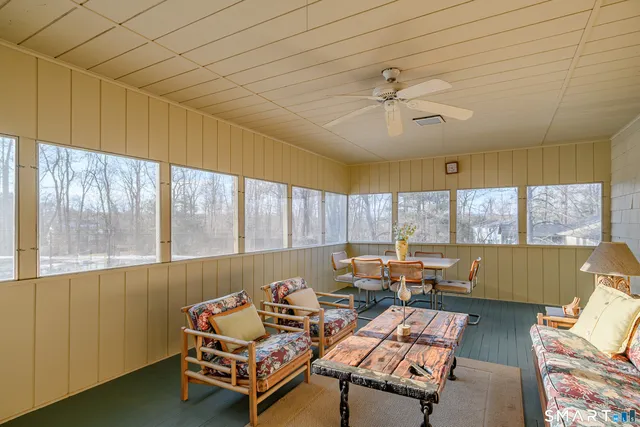 a room with furniture and a window