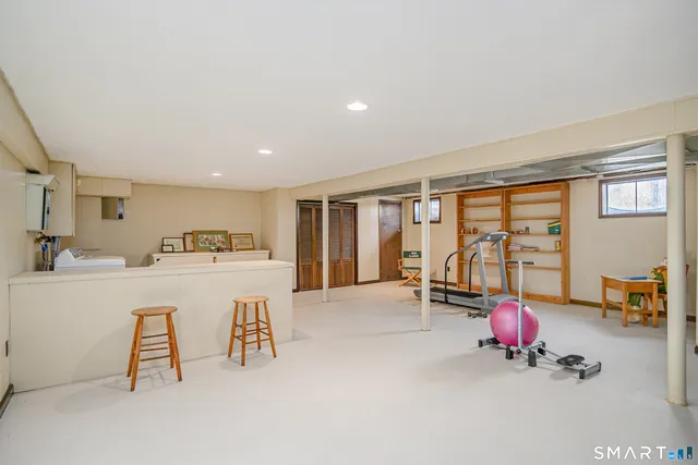 a living room with furniture and a table