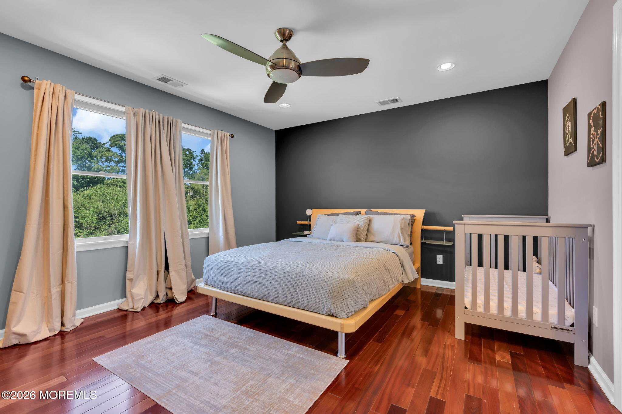 14 Diamond Hill Road Marlboro, NJ 07746 - Photo 47 of 79 a bedroom with a bed and wooden floor