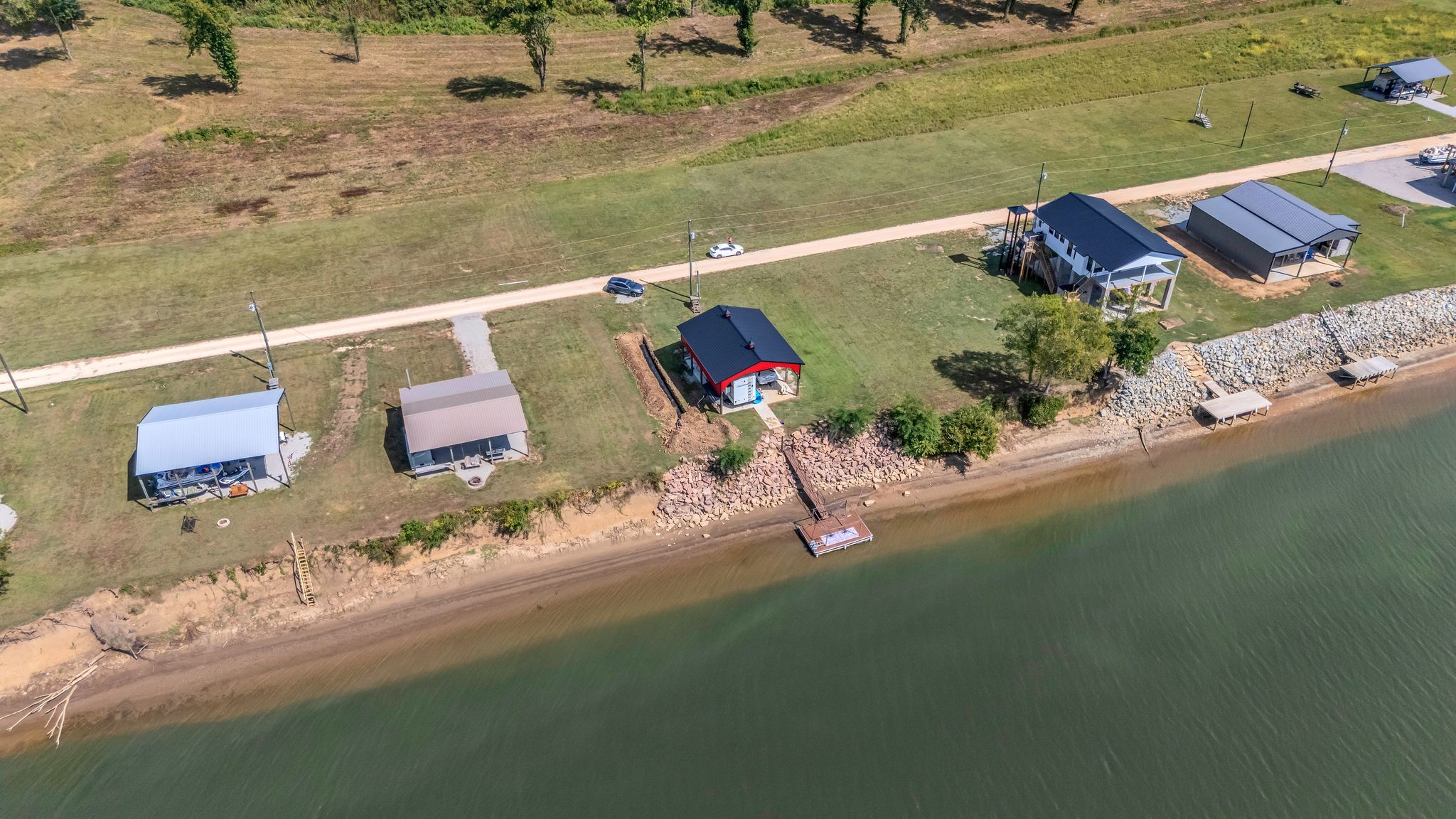 894 Lexi Lane Clifton, TN 38425 - Photo 31 of 35 an aerial view of a house with a lake view