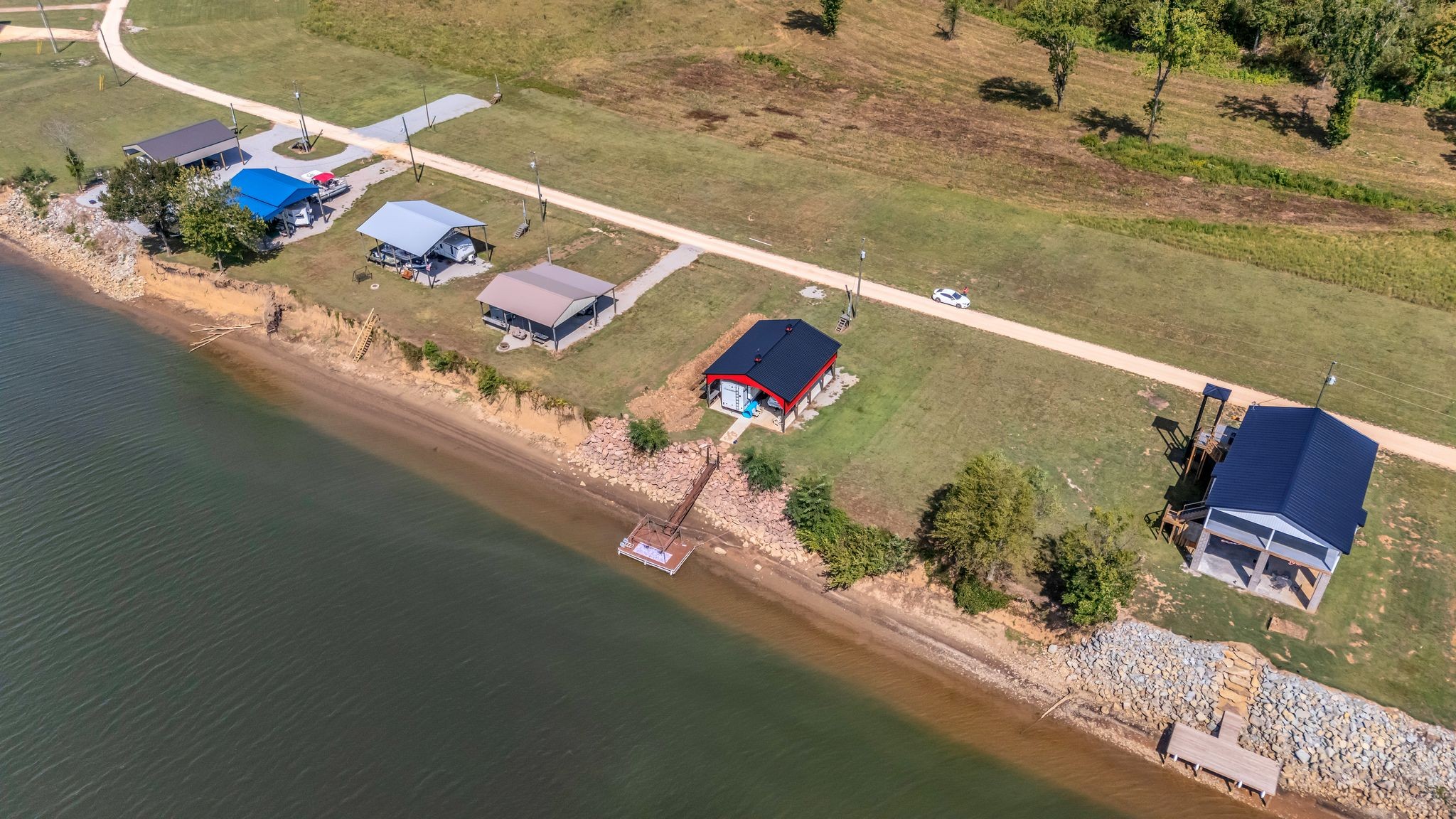 894 Lexi Lane Clifton, TN 38425 - Photo 33 of 35 an aerial view of a house a yard and a chair