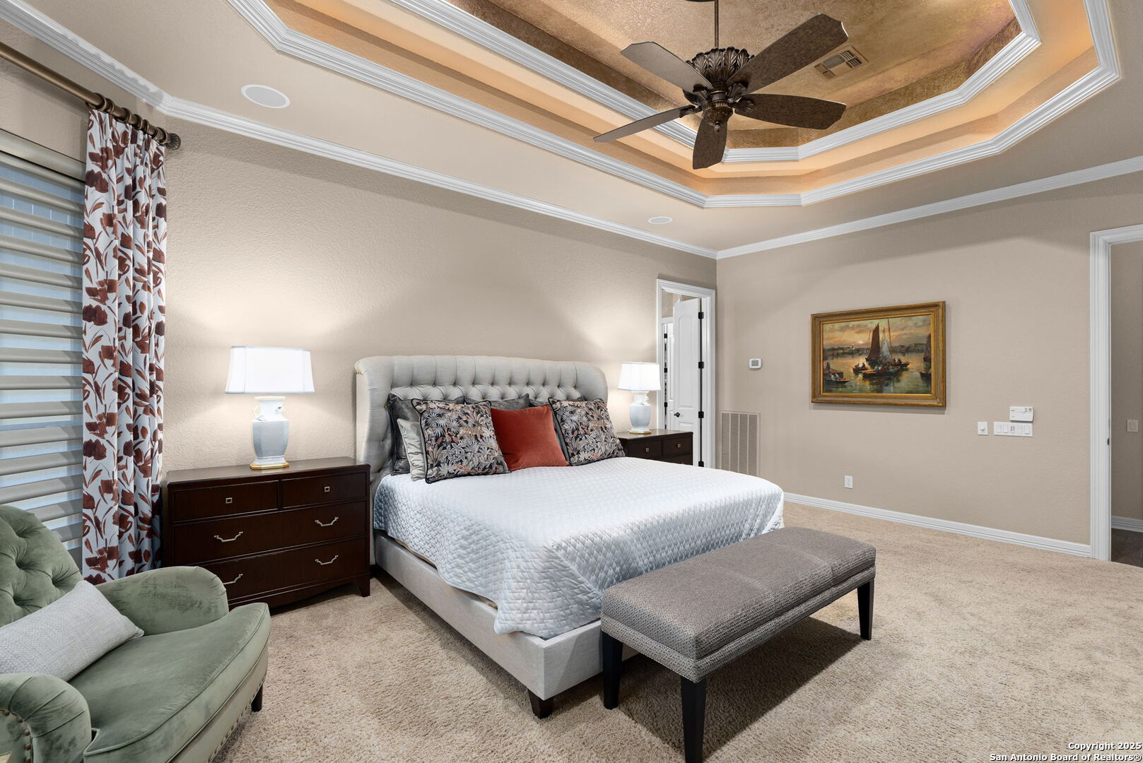 20027 Buckhead Lane Garden Ridge, TX 78266 - Photo 17 of 70 a bedroom with a bed and a chandelier