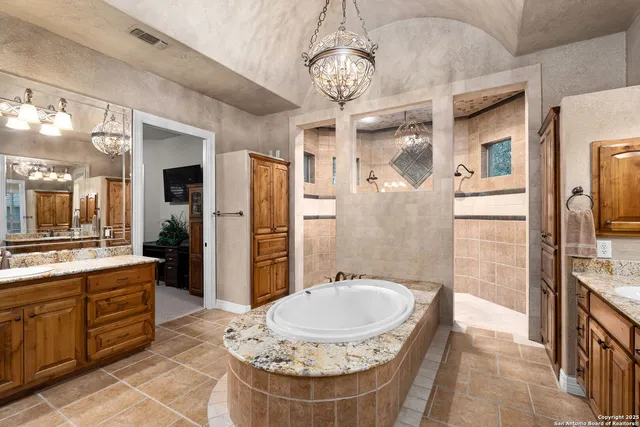 a kitchen with counter top space and center island