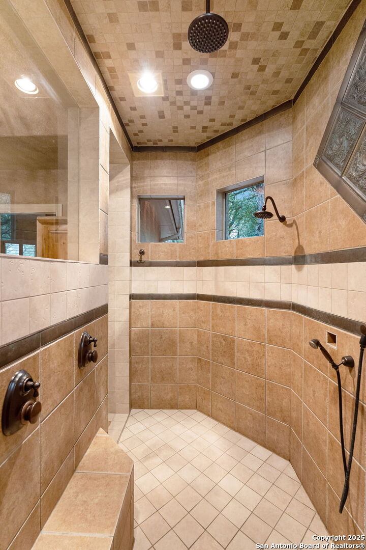 20027 Buckhead Lane Garden Ridge, TX 78266 - Photo 20 of 70 a bathroom with a sink and a mirror
