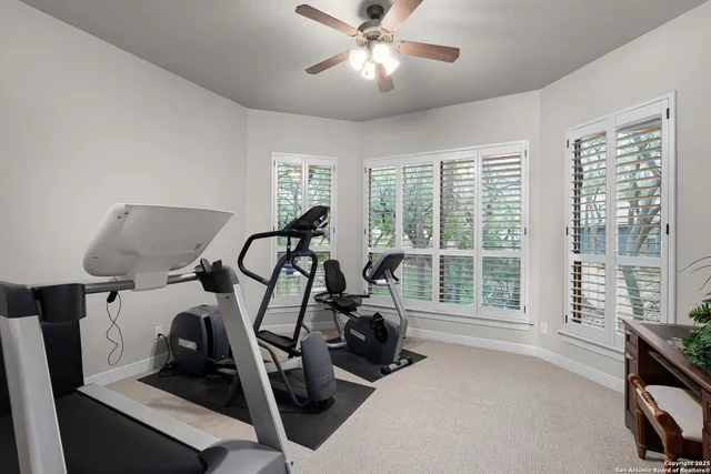 a kitchen with granite countertop a sink and cabinets