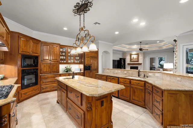 a bathroom with a sink vanity and a mirror