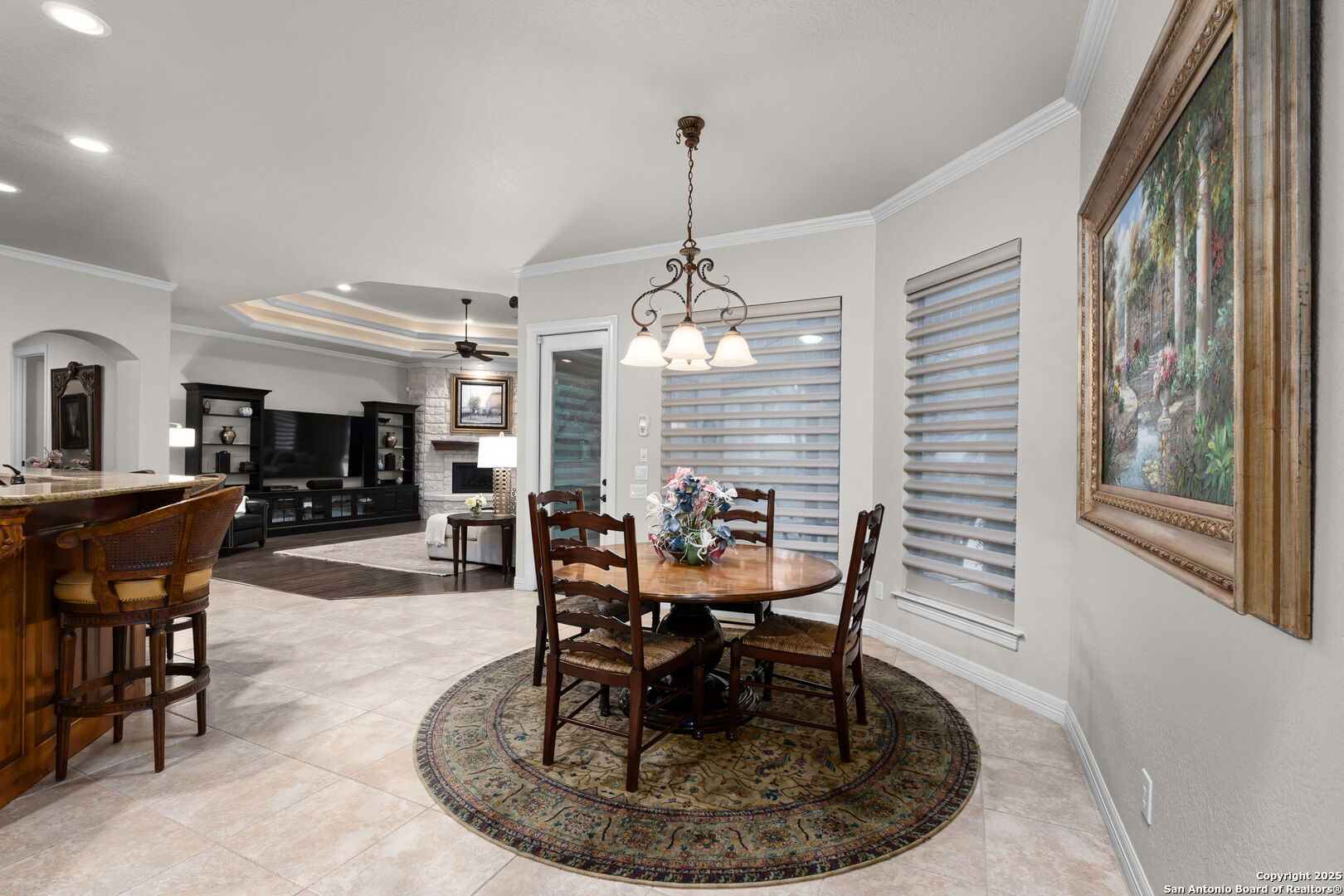 20027 Buckhead Lane Garden Ridge, TX 78266 - Photo 35 of 70 a dining room with furniture a rug and wooden floor