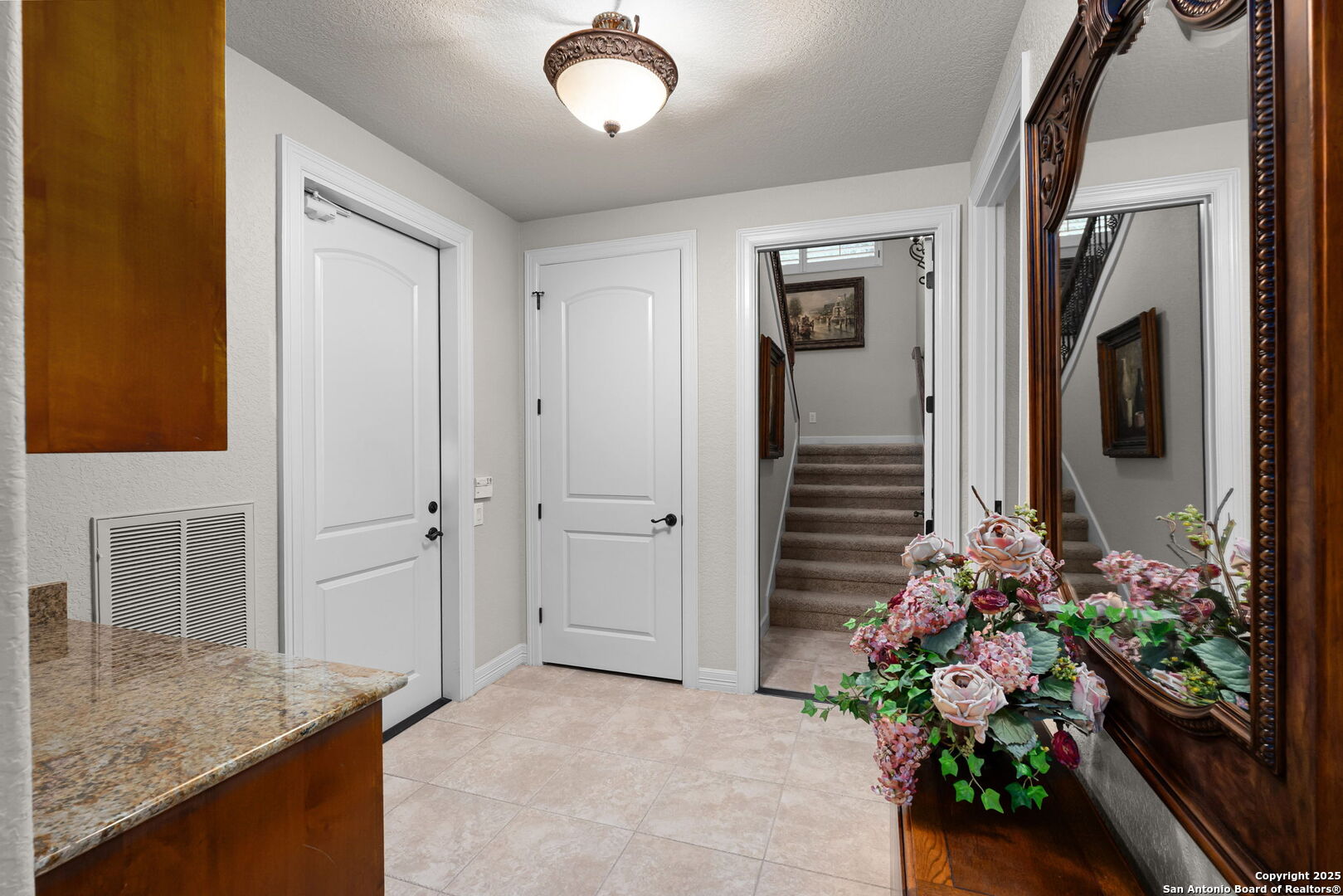 20027 Buckhead Lane Garden Ridge, TX 78266 - Photo 39 of 70 an entryway with wooden floor and a potted plant