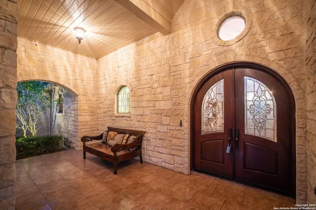 a view of a park with large trees