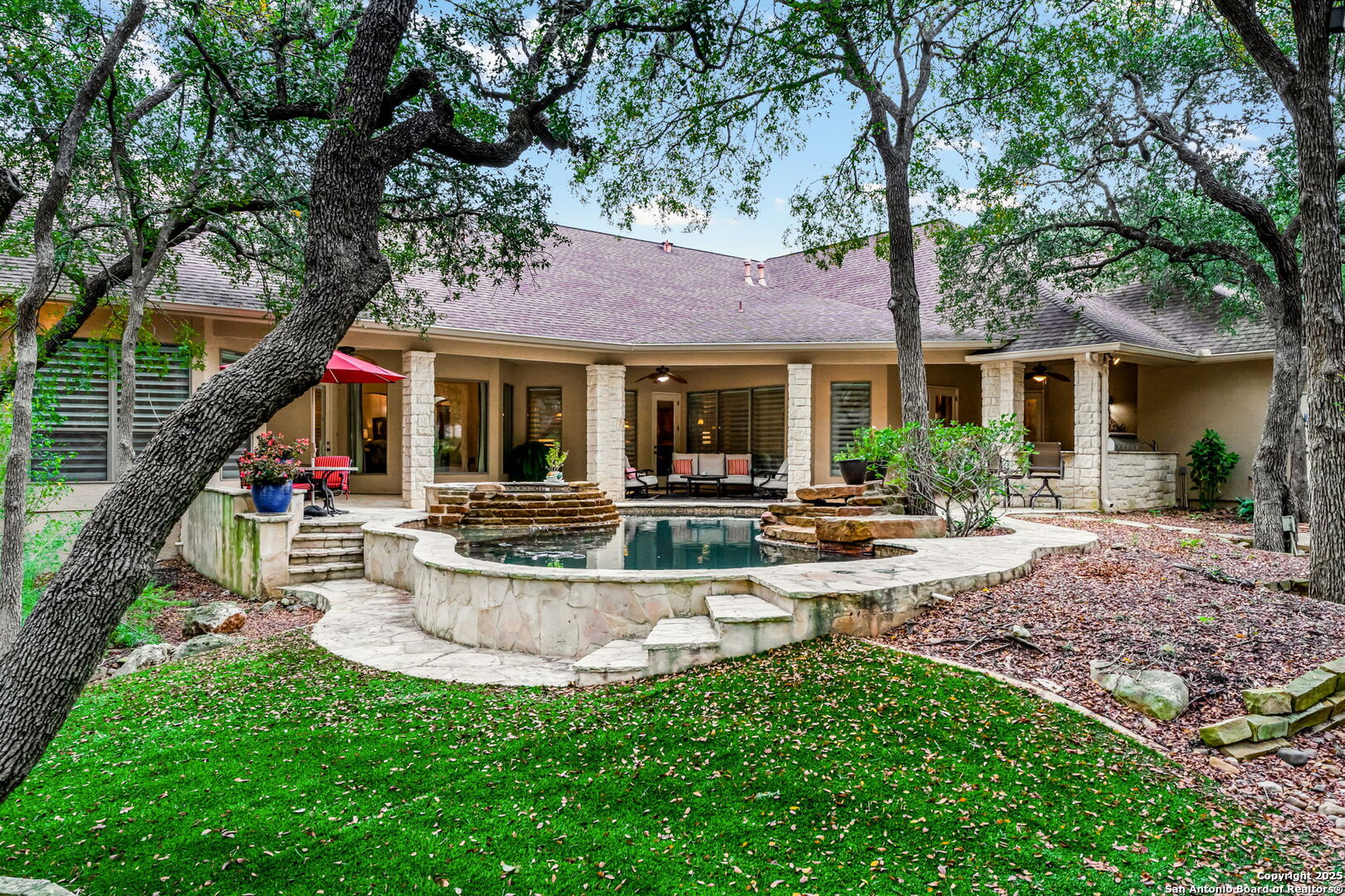 20027 Buckhead Lane Garden Ridge, TX 78266 - Photo 52 of 70 a view of a house with backyard and sitting area