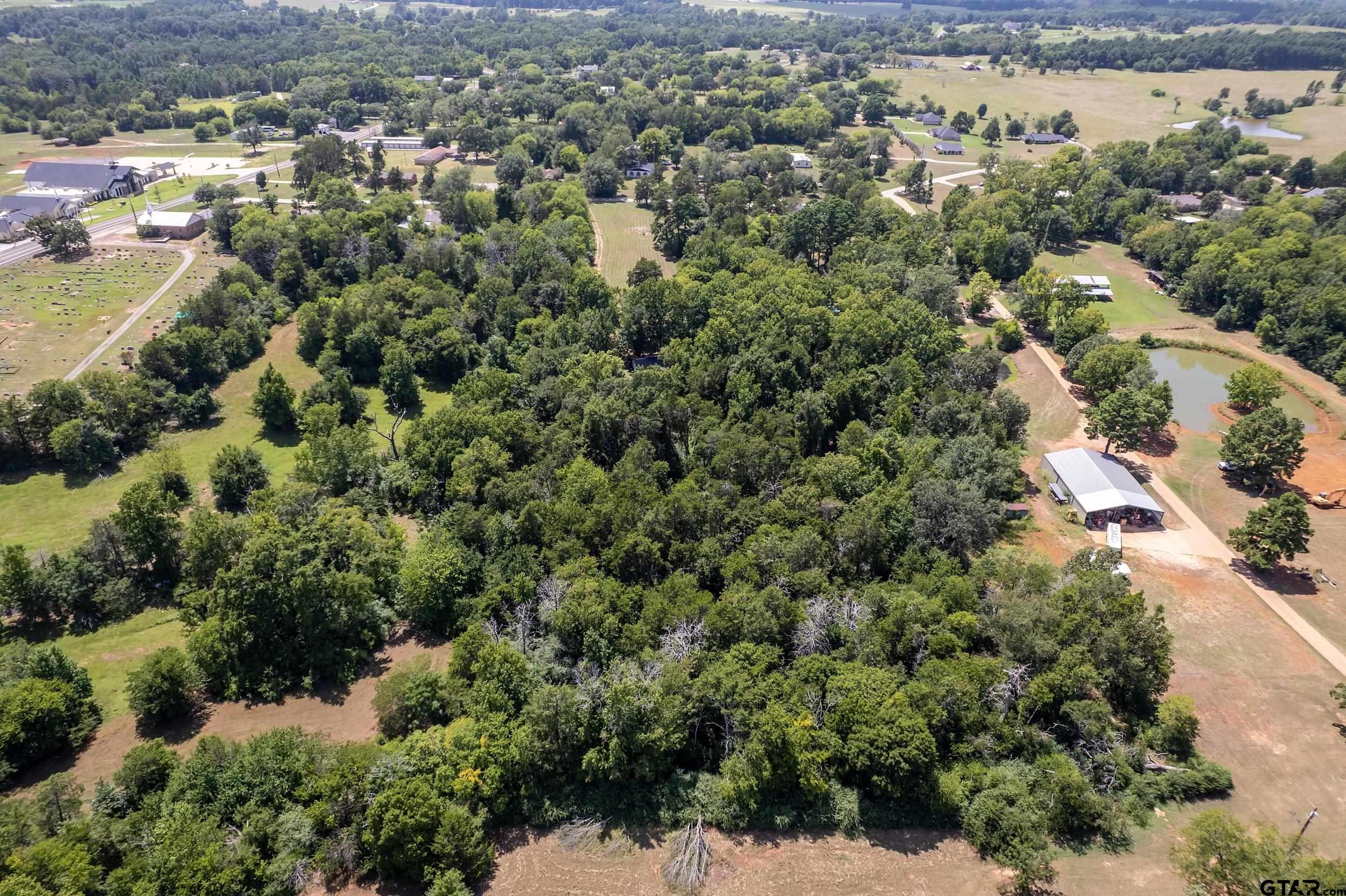 13174 County Road 434 Lindale, TX 75771 - Photo 29 of 32 an aerial view of a residential houses with city and green space
