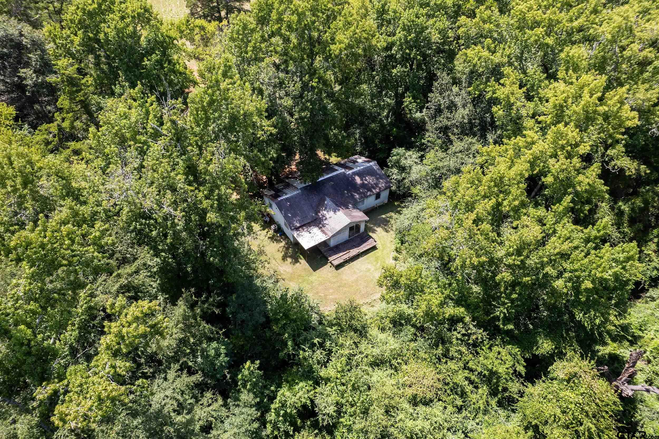 13174 County Road 434 Lindale, TX 75771 - Photo 31 of 32 an aerial view of a house with a yard