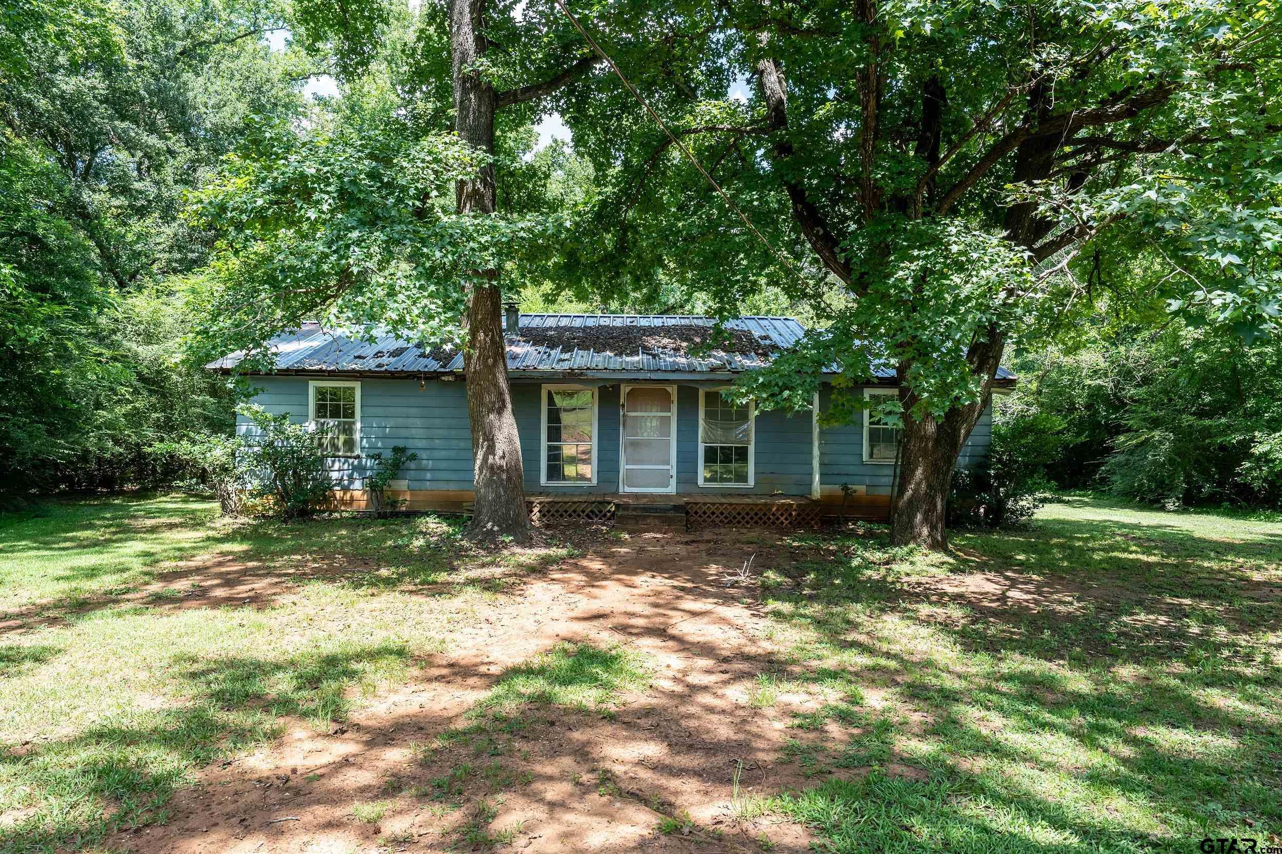 13174 County Road 434 Lindale, TX 75771 - Photo 5 of 32 a view of a house with a yard