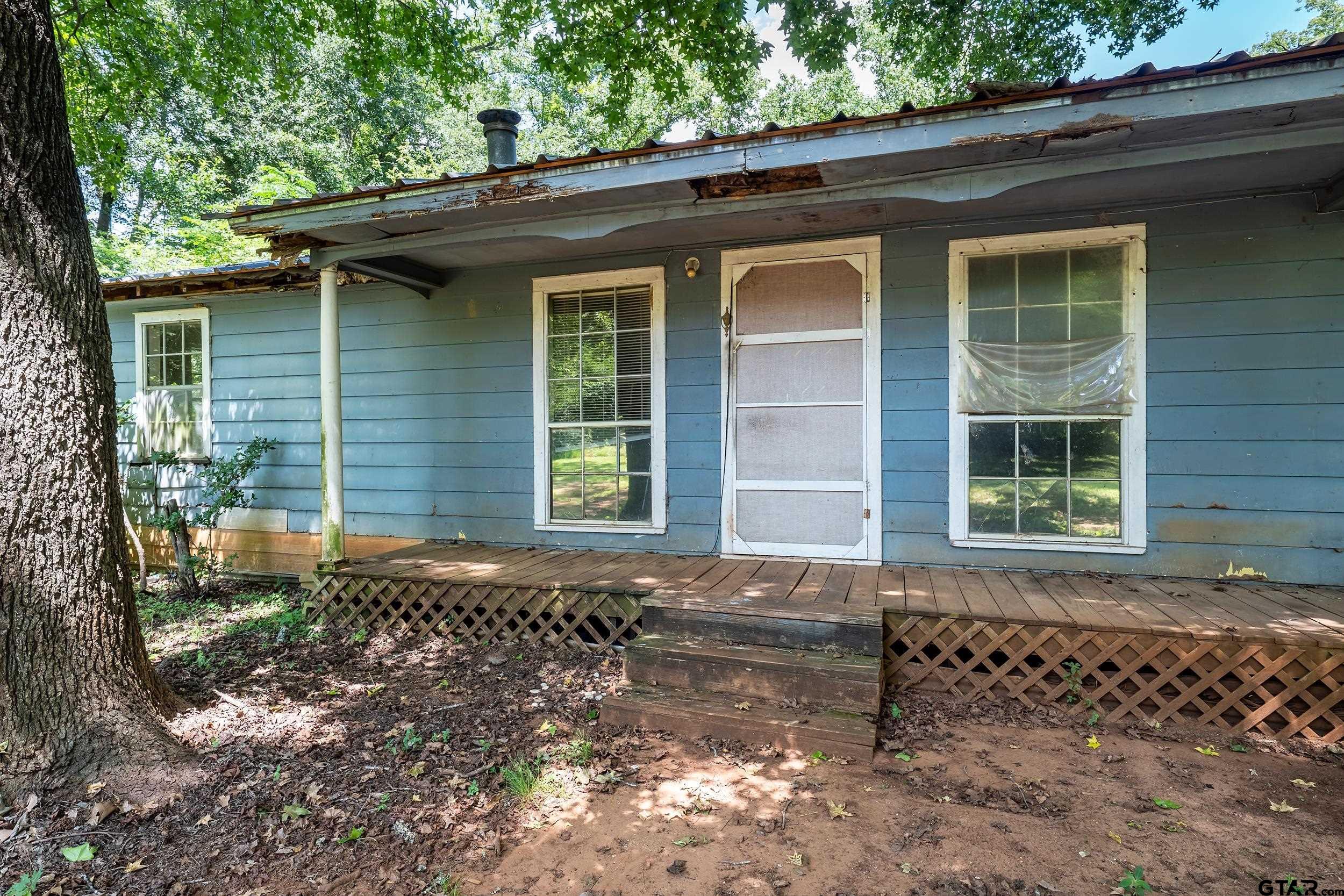 13174 County Road 434 Lindale, TX 75771 - Photo 10 of 32 a front view of a house with a yard